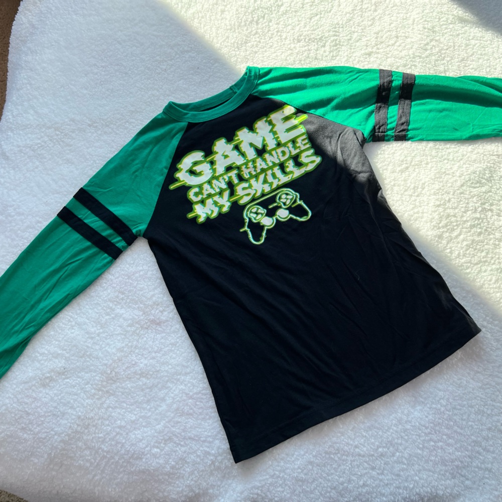 Boys long sleeve t shirt. Size medium